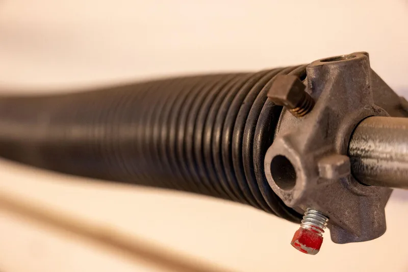 Garage door cable repair service by American Garage Door Solutions technician in San Mateo